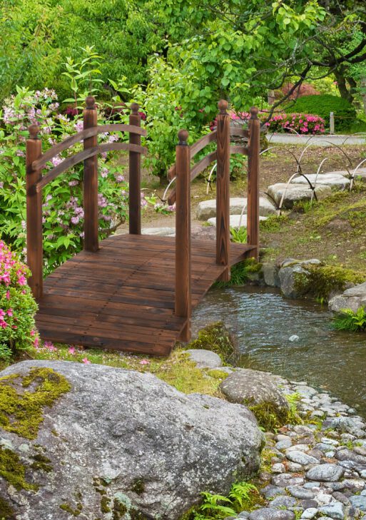 7.5' Fir Wood Garden Bridge Arc Walkway with Side Railings, Perfect for Backyards, Gardens, & Streams, Carbonized